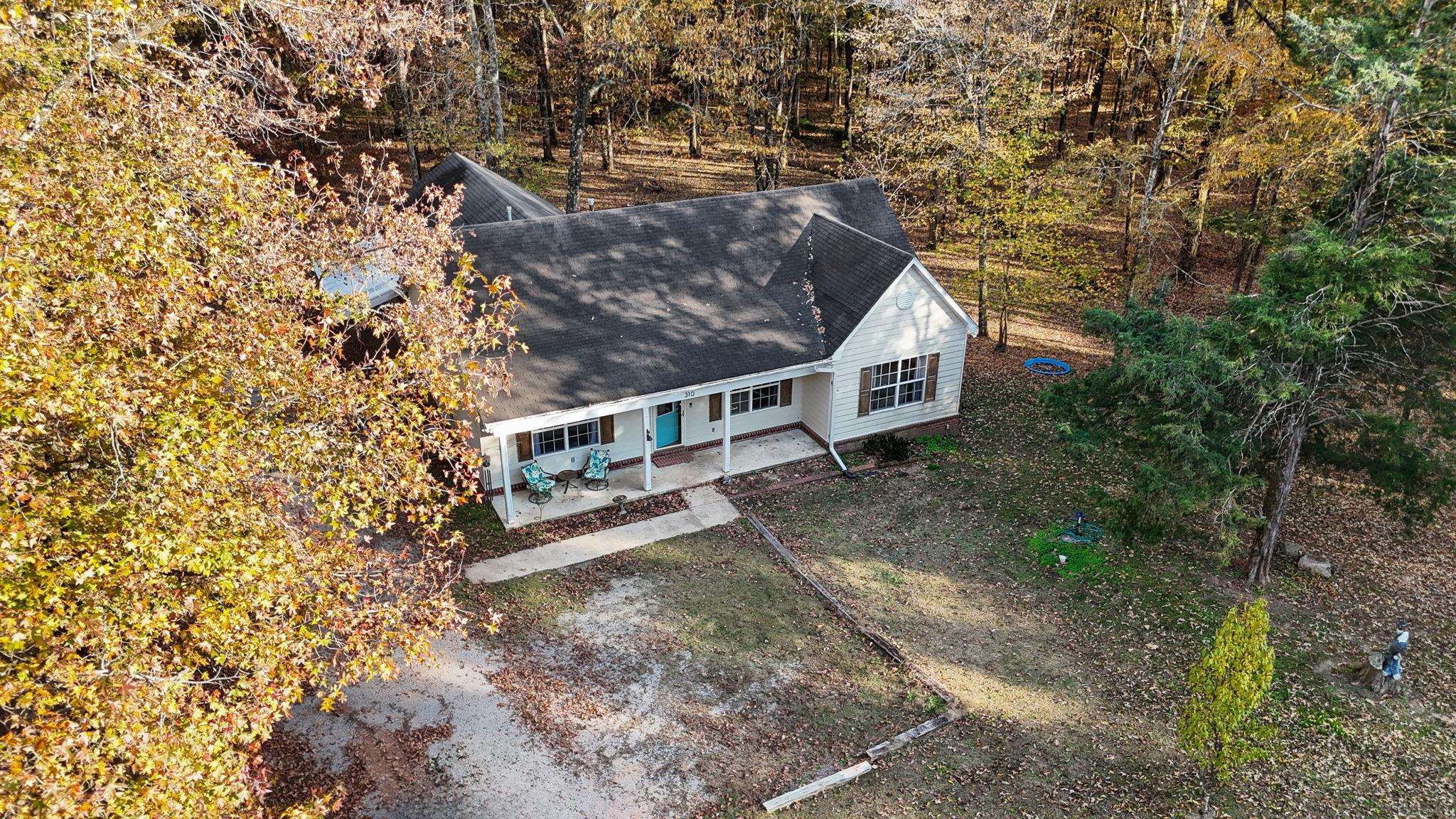 310 Liberty Road Moscow, TN 38057 - Photo 29 of 32 a view of a house with a yard