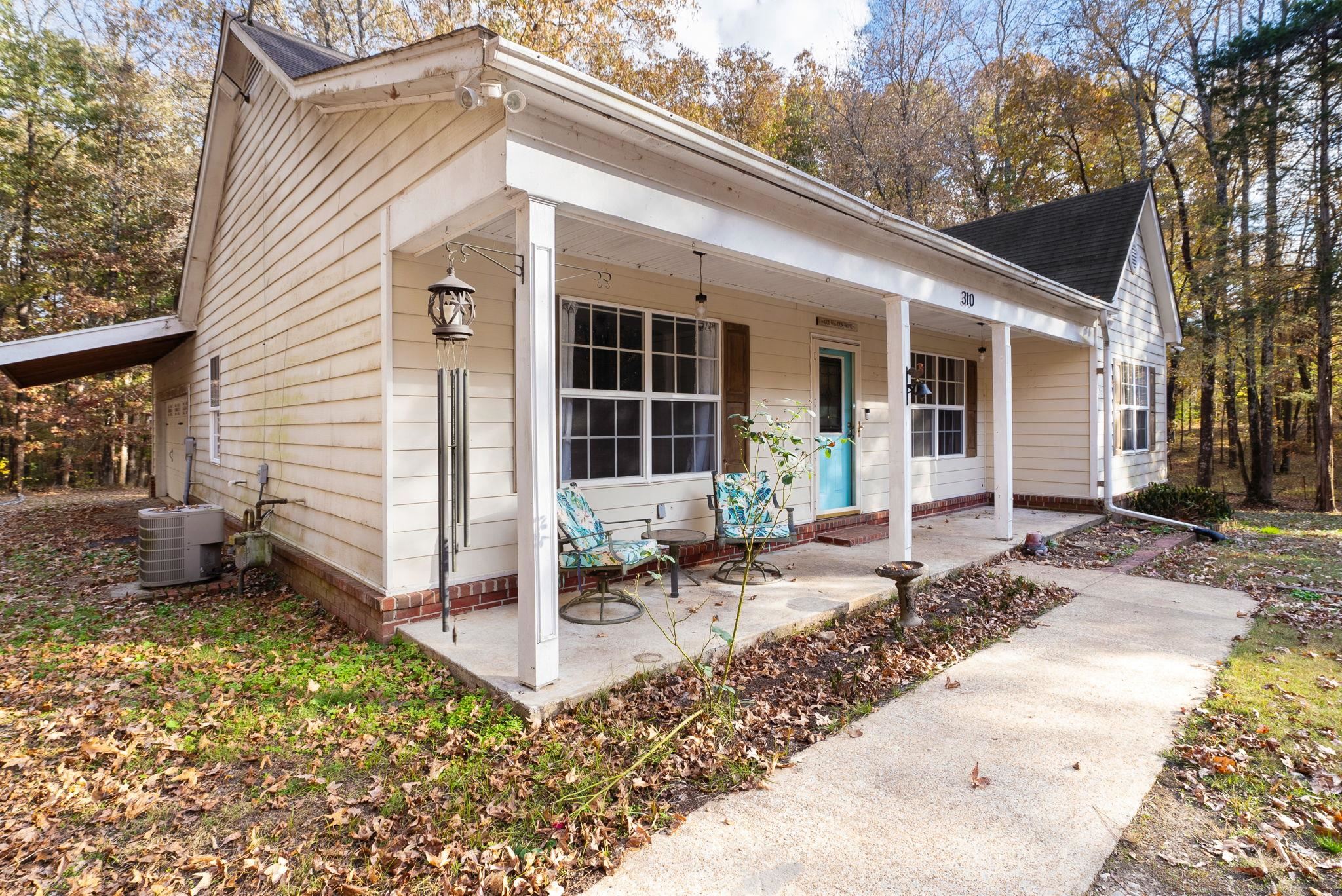 310 Liberty Road Moscow, TN 38057 - Photo 5 of 32 a front view of a house with porch