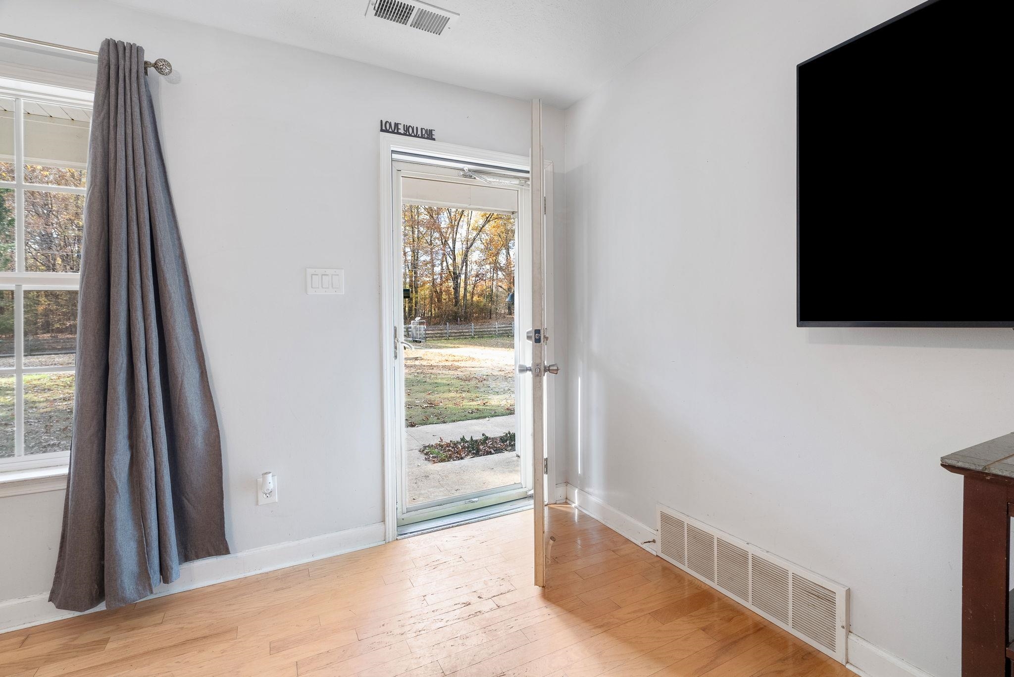 310 Liberty Road Moscow, TN 38057 - Photo 6 of 32 an empty room with windows