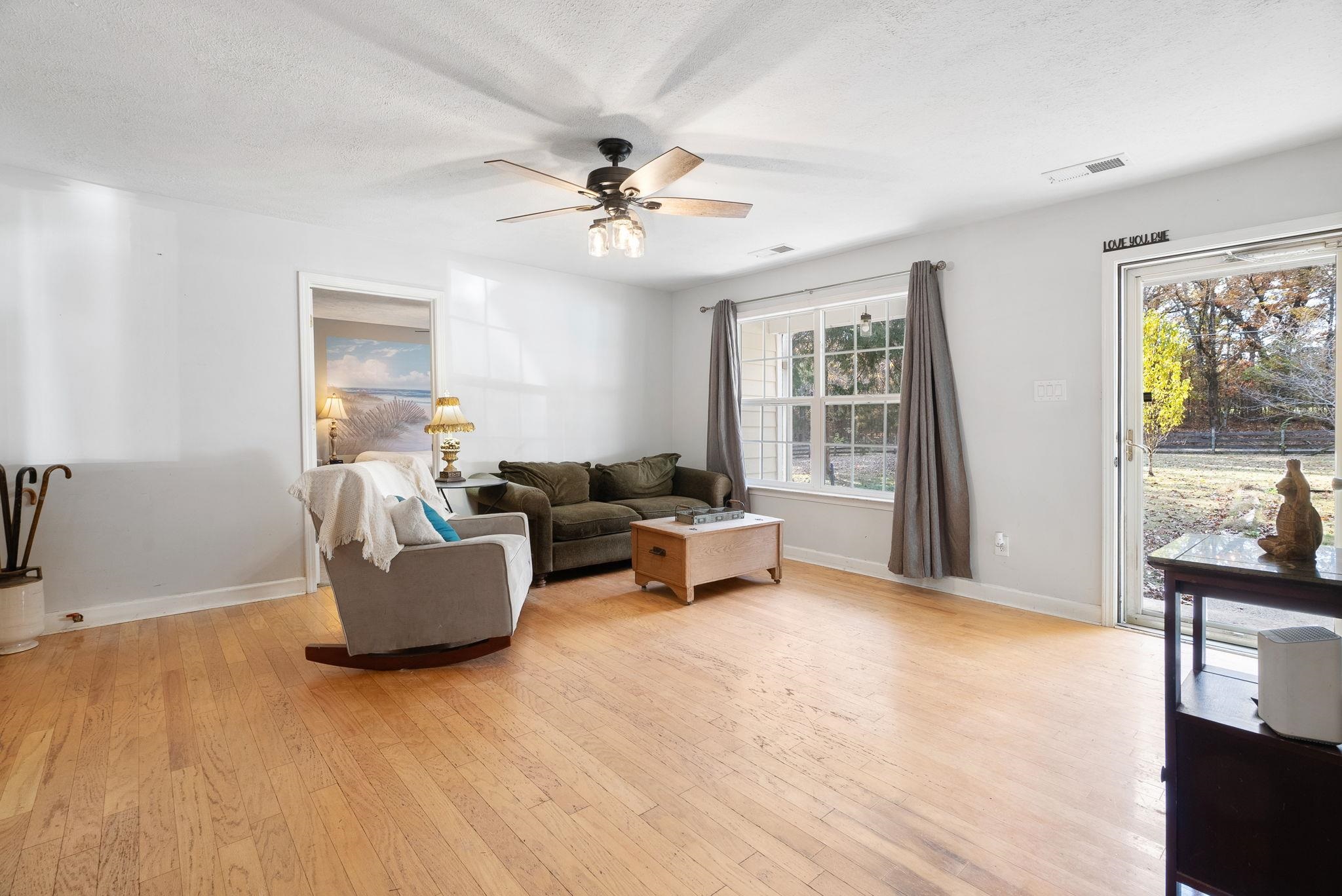 310 Liberty Road Moscow, TN 38057 - Photo 7 of 32 a living room with furniture and a large window