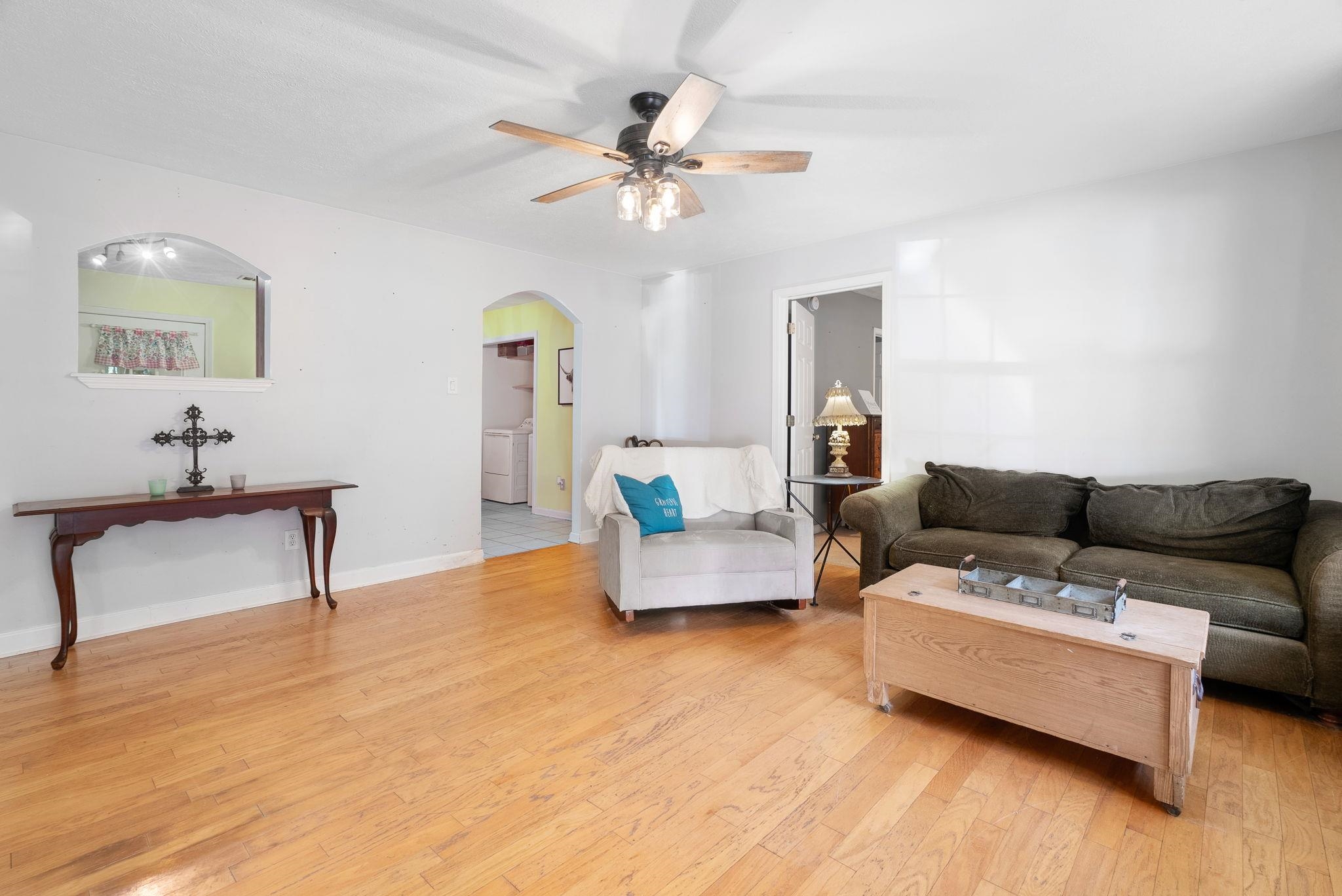 310 Liberty Road Moscow, TN 38057 - Photo 9 of 32 a living room with furniture and a wooden floor
