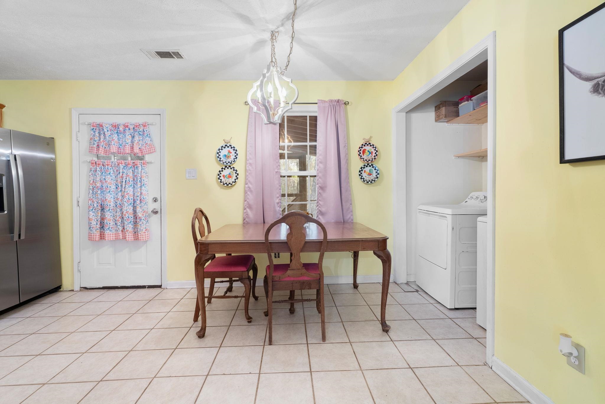 310 Liberty Road Moscow, TN 38057 - Photo 10 of 32 a view of a dining room with furniture