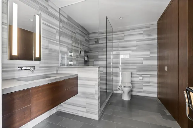 a bathroom with a sink and a shower