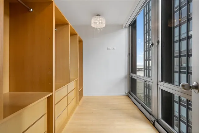 a view of a hallway with a door
