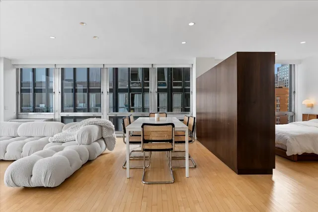 a living room with furniture and a table
