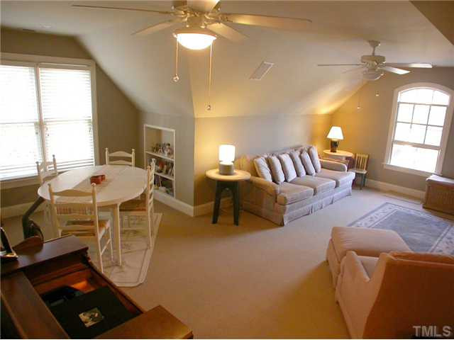 163 Yorkchester Way Raleigh, NC 27615 - Photo 21 of 25 Enjoy your HUGE bonus room with plenty of room to stretch out, ceiling fans, built ins and surround sound. Bonus Room