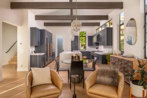 a living room with fireplace furniture and a flat screen tv