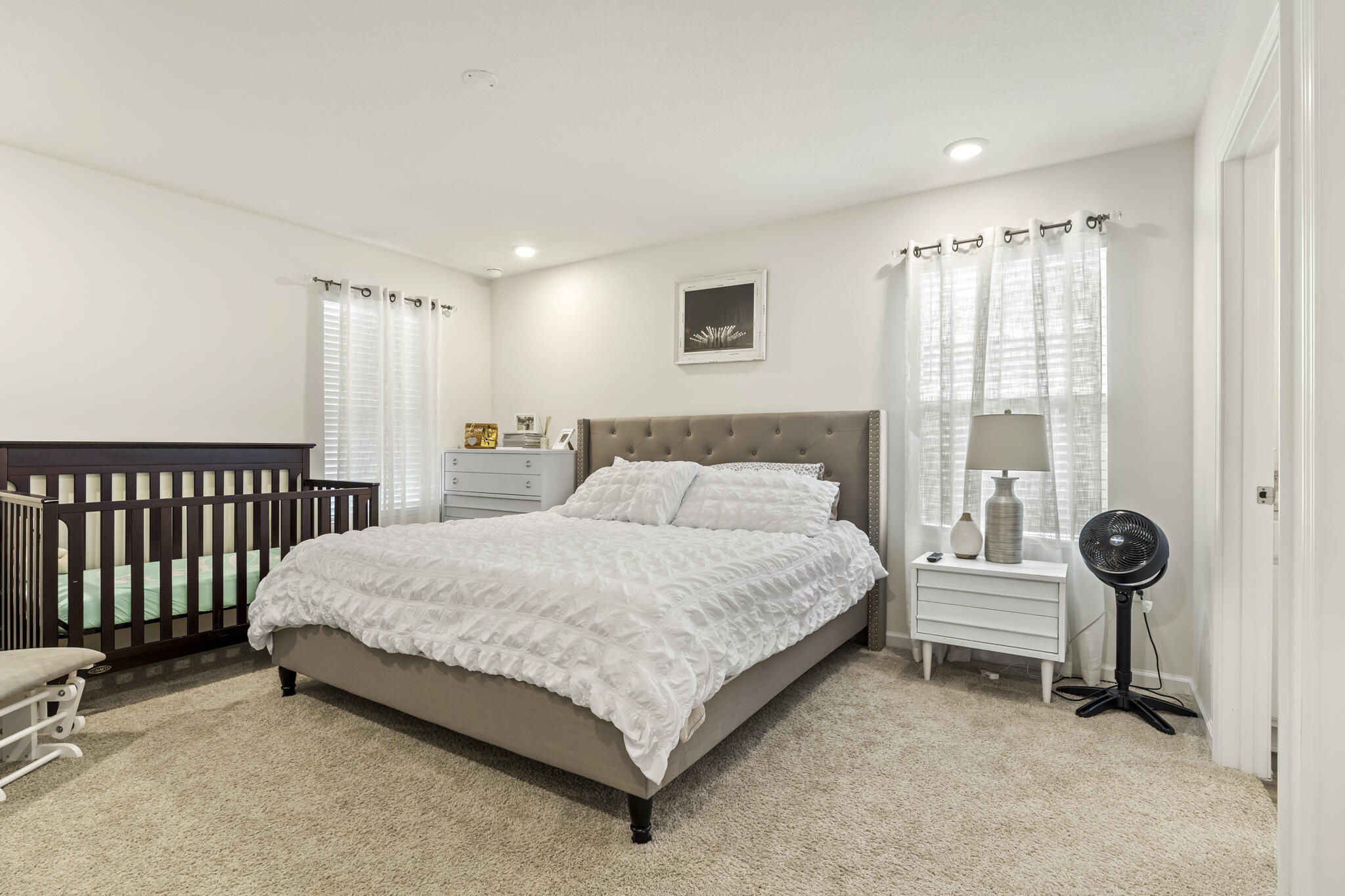 916 Merganser Way Crestview, FL 32539 - Photo 15 of 27 a bedroom with a bed and a window