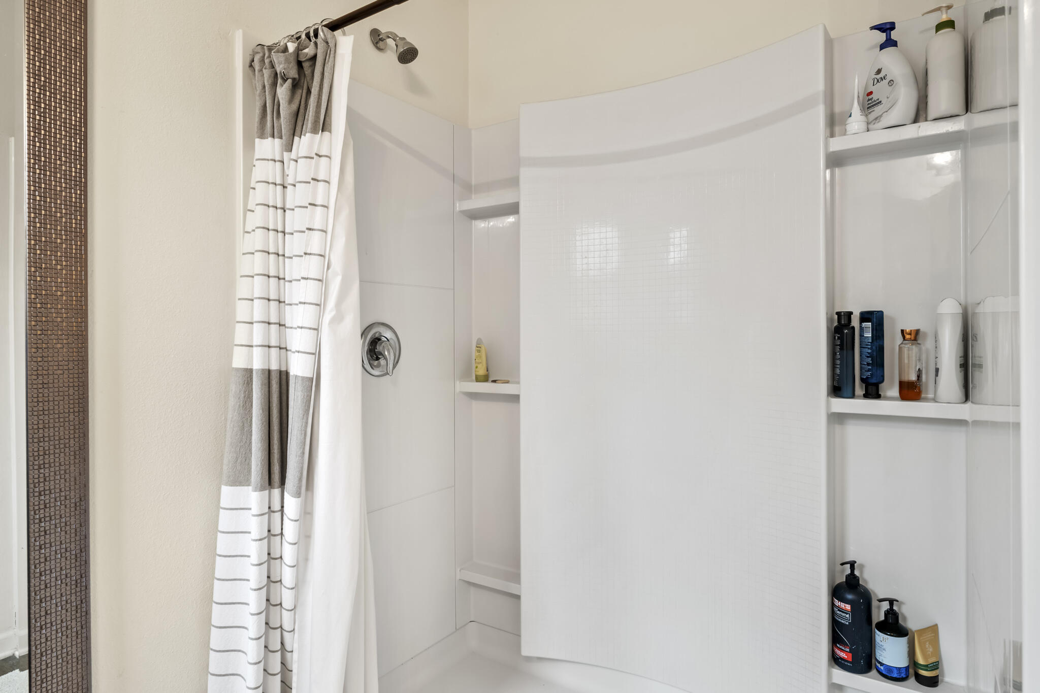 916 Merganser Way Crestview, FL 32539 - Photo 18 of 27 a bathroom with a shower and a sink