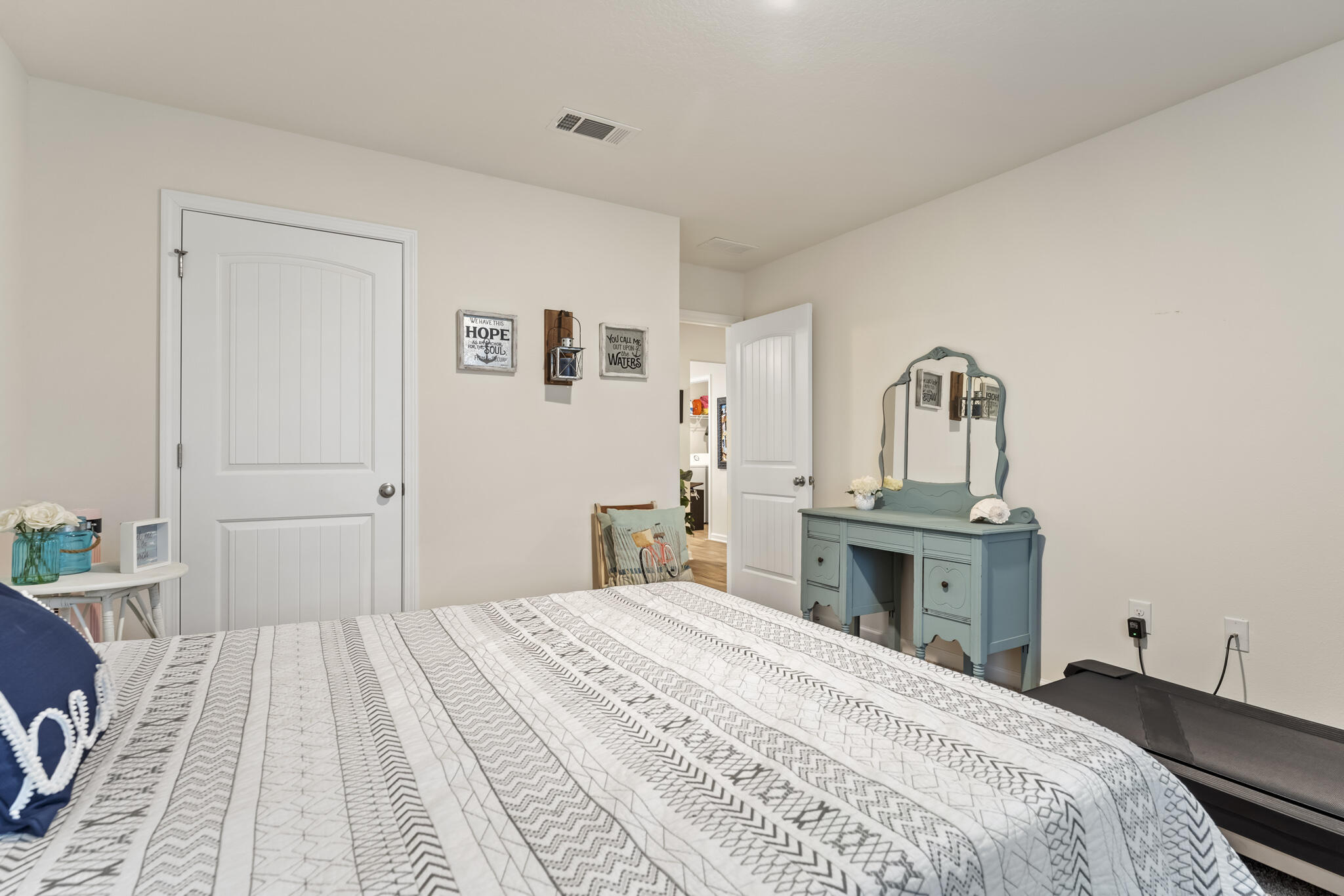 916 Merganser Way Crestview, FL 32539 - Photo 20 of 27 a bedroom with a bed and a dresser
