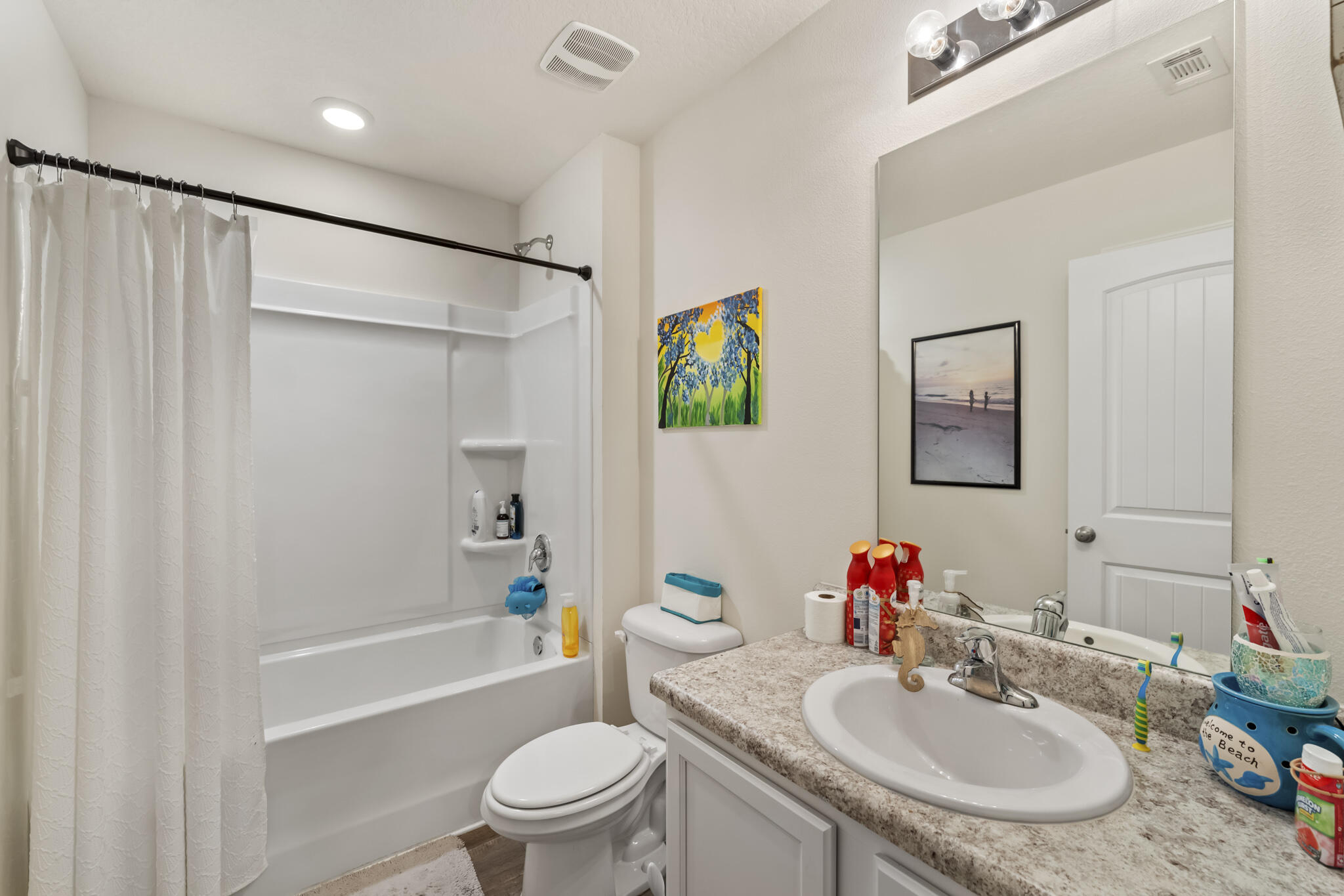 916 Merganser Way Crestview, FL 32539 - Photo 21 of 27 a bathroom with a sink toilet and a bathtub