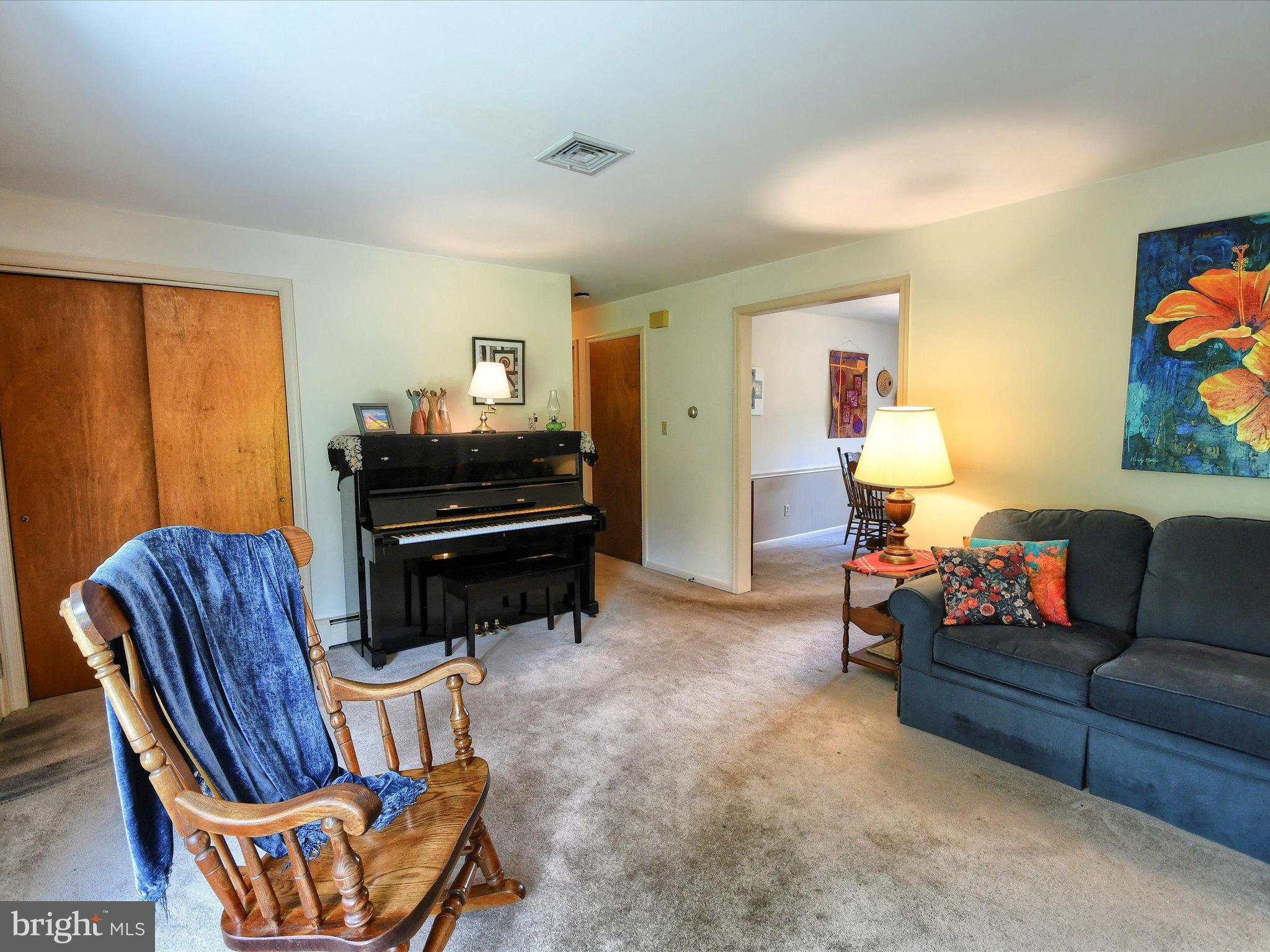 1209 Telegraph Road Perkasie, PA 18944 - Photo 11 of 49 a living room with furniture and a piano