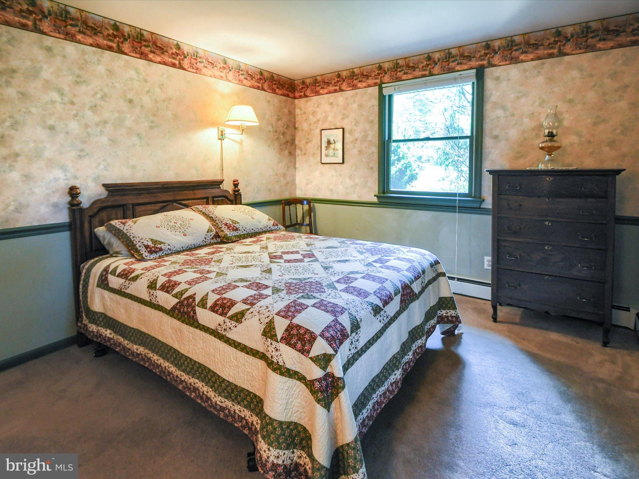 1209 Telegraph Road Perkasie, PA 18944 - Photo 24 of 49 a bedroom with a bed and window