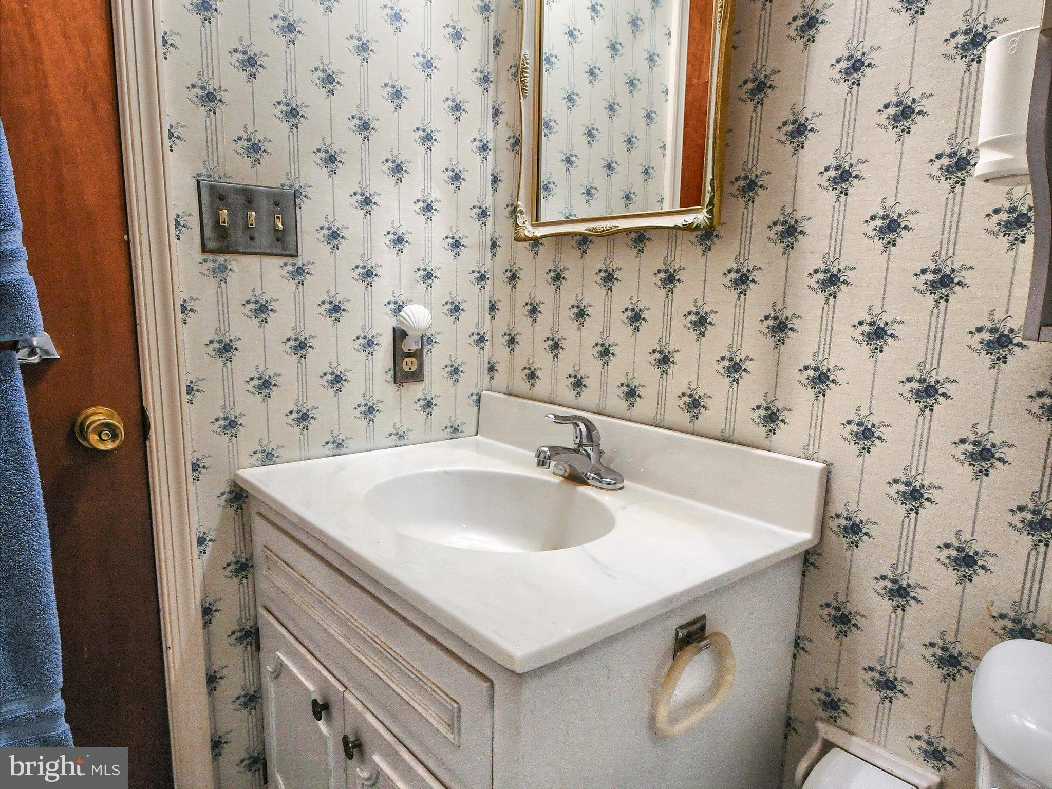 1209 Telegraph Road Perkasie, PA 18944 - Photo 27 of 49 a bathroom with a sink and a toilet