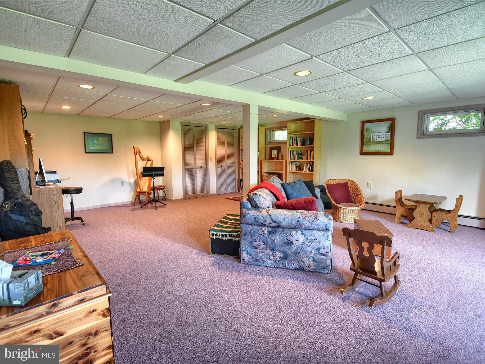 1209 Telegraph Road Perkasie, PA 18944 - Photo 28 of 49 a living room with furniture and a gym equipment