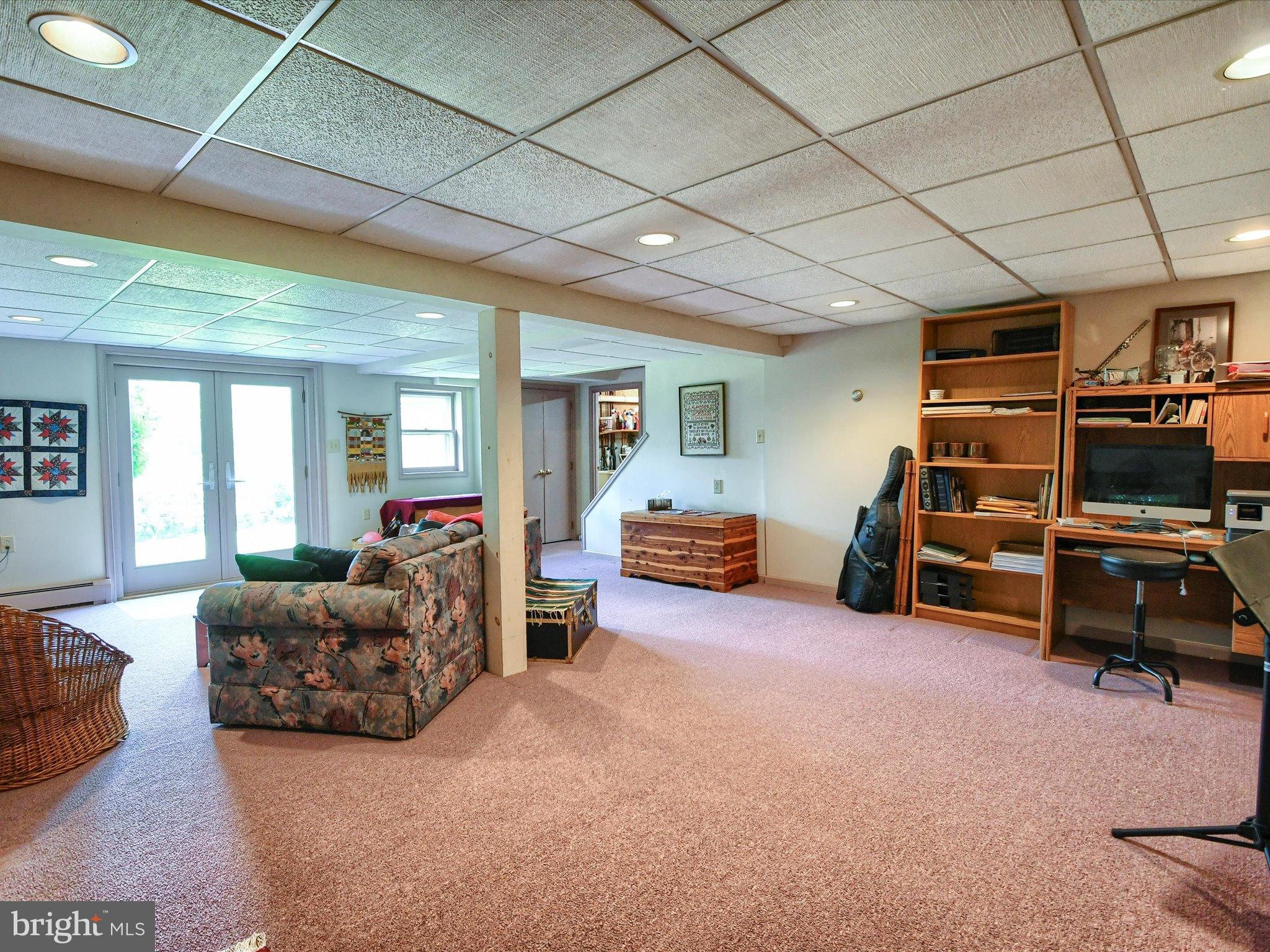 1209 Telegraph Road Perkasie, PA 18944 - Photo 30 of 49 a bedroom with furniture and a large window