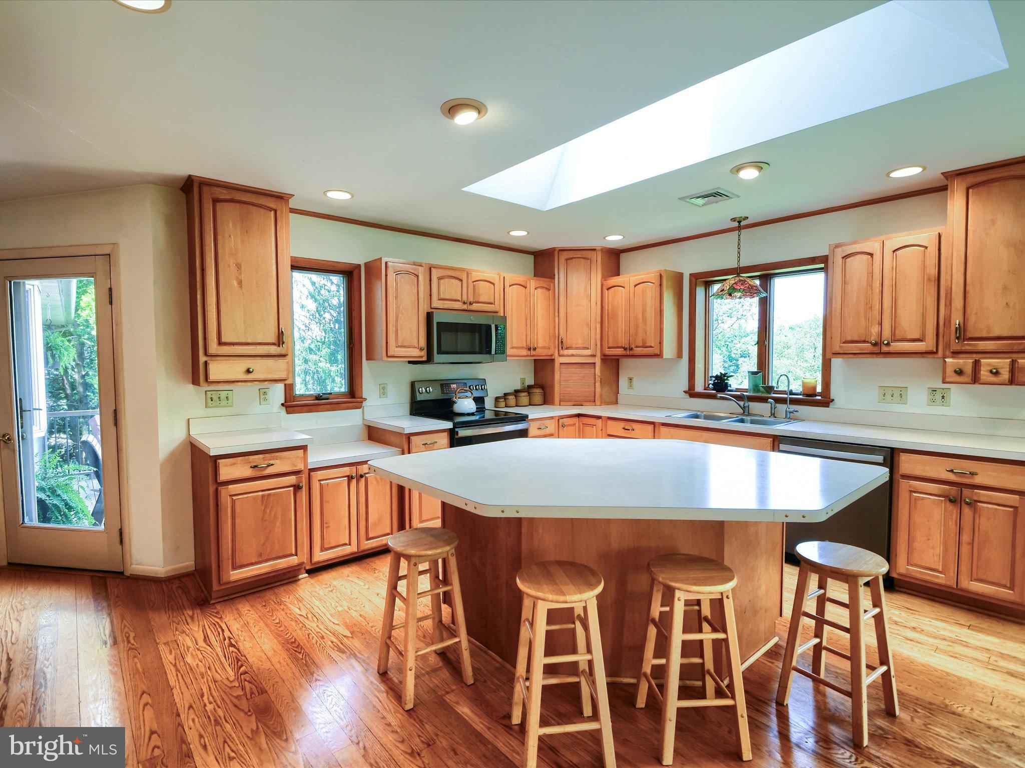 1209 Telegraph Road Perkasie, PA 18944 - Photo 3 of 49 a kitchen with stainless steel appliances granite countertop counter space a sink and a window