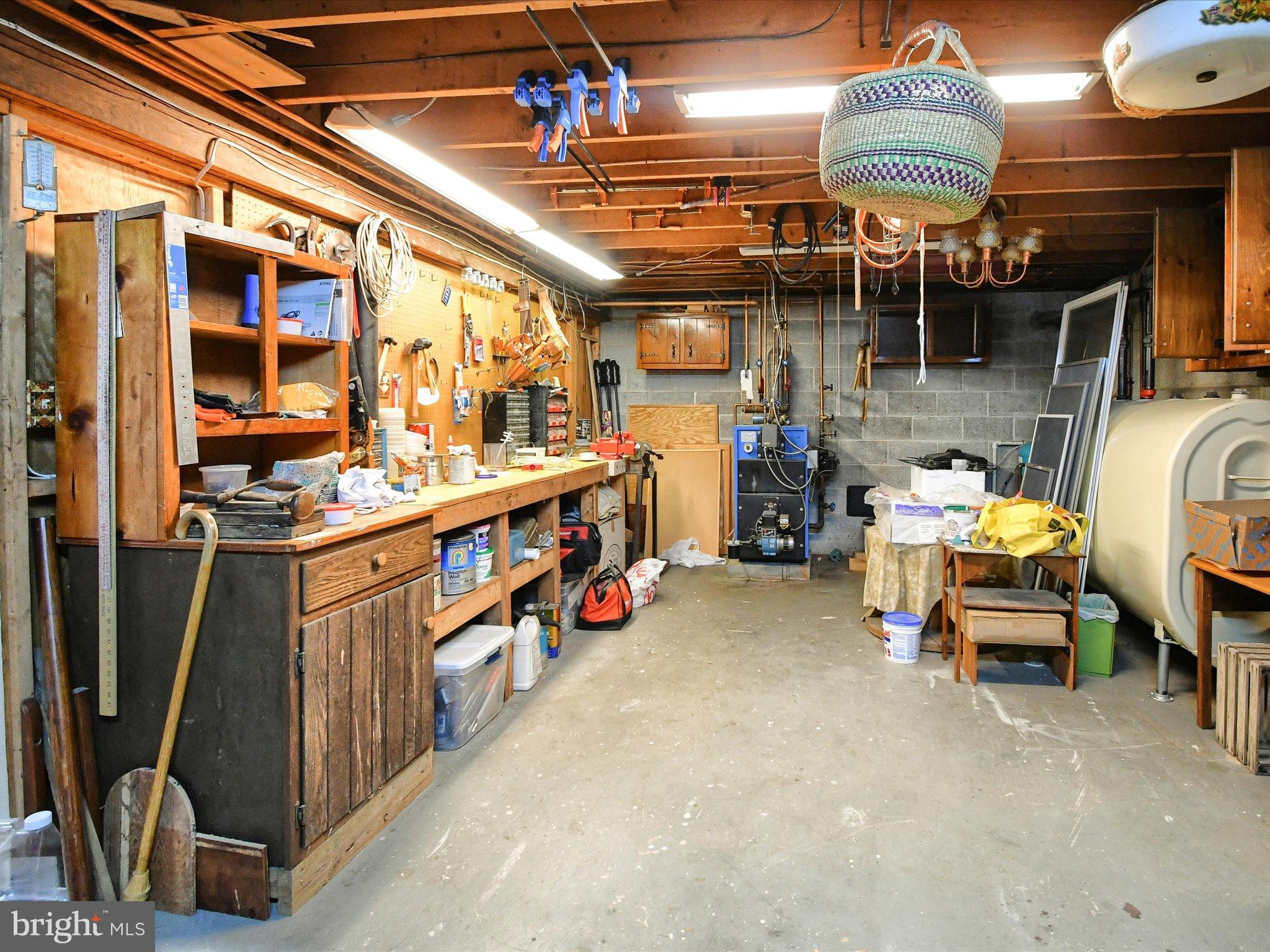 1209 Telegraph Road Perkasie, PA 18944 - Photo 34 of 49 a view of a storage room with a lot of stuff