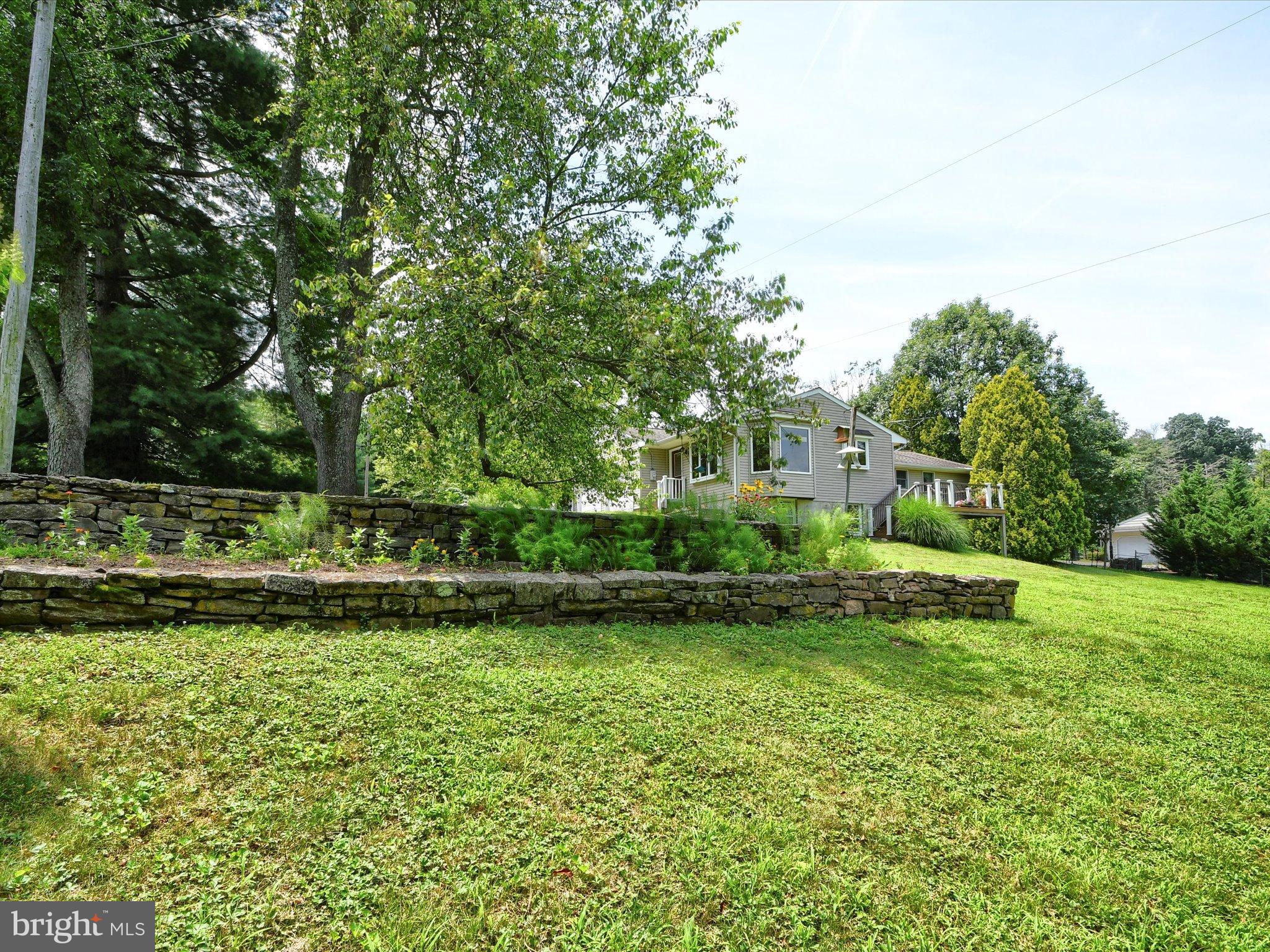 1209 Telegraph Road Perkasie, PA 18944 - Photo 43 of 49 a view of a garden