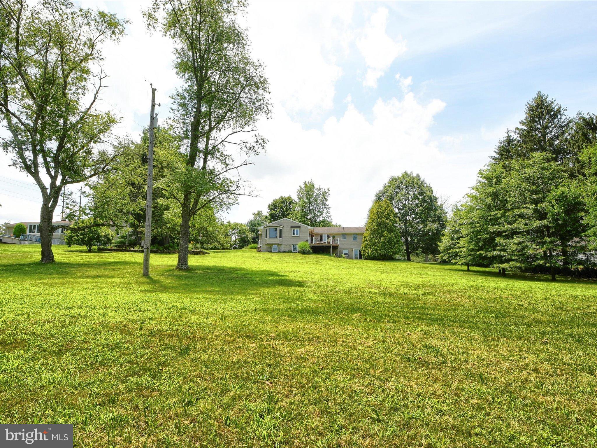 1209 Telegraph Road Perkasie, PA 18944 - Photo 45 of 49 a view of a field with trees in the background