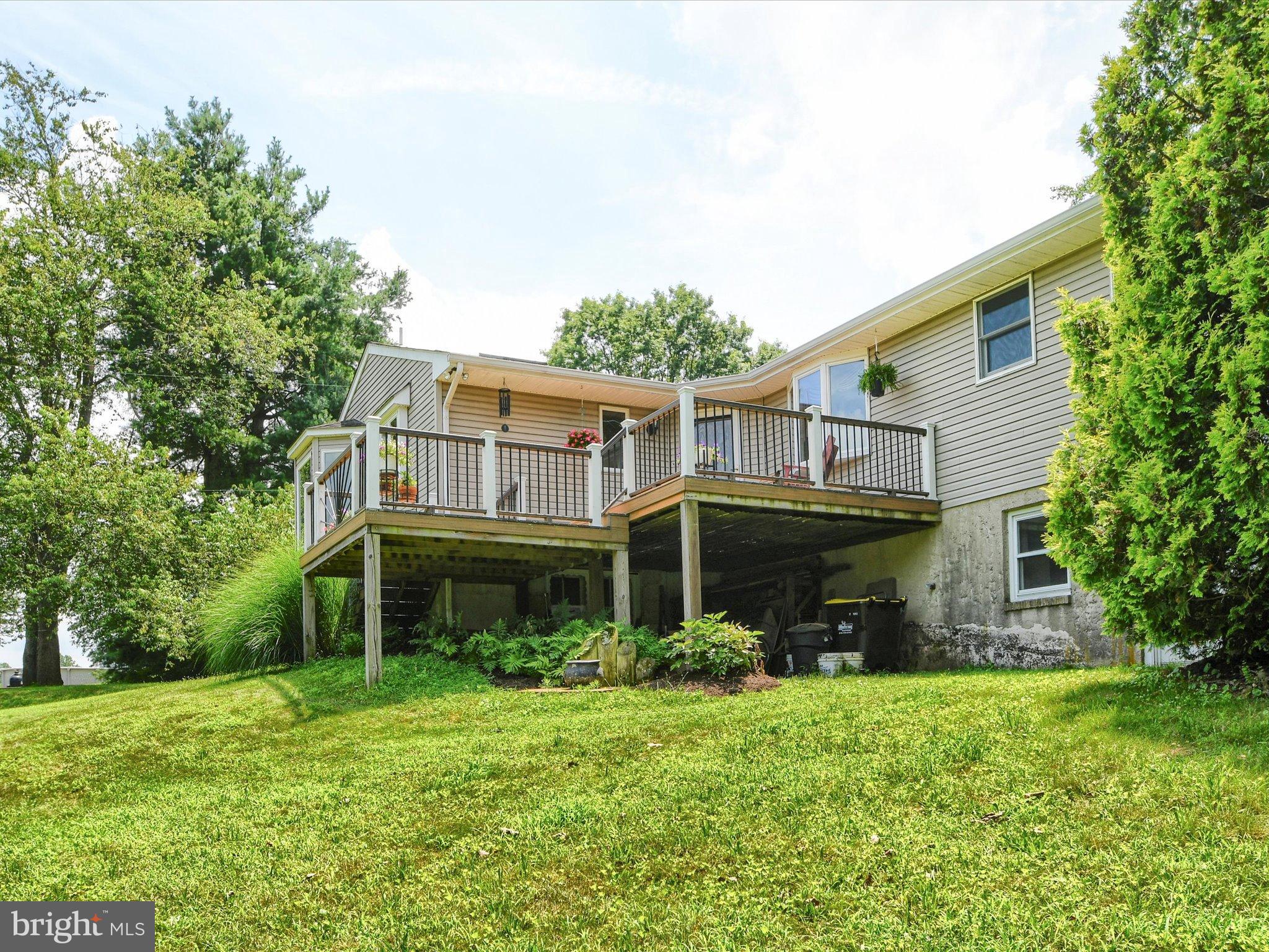 1209 Telegraph Road Perkasie, PA 18944 - Photo 47 of 49 a front view of a house with a yard and porch