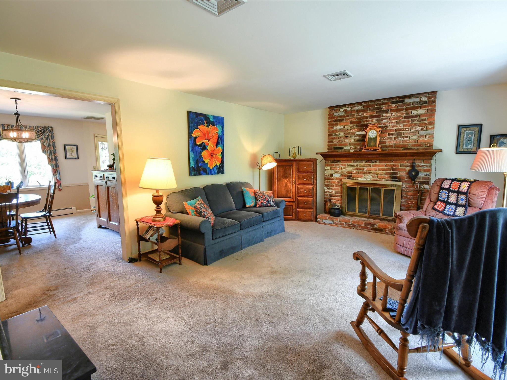 1209 Telegraph Road Perkasie, PA 18944 - Photo 10 of 49 a living room with furniture and a flat screen tv