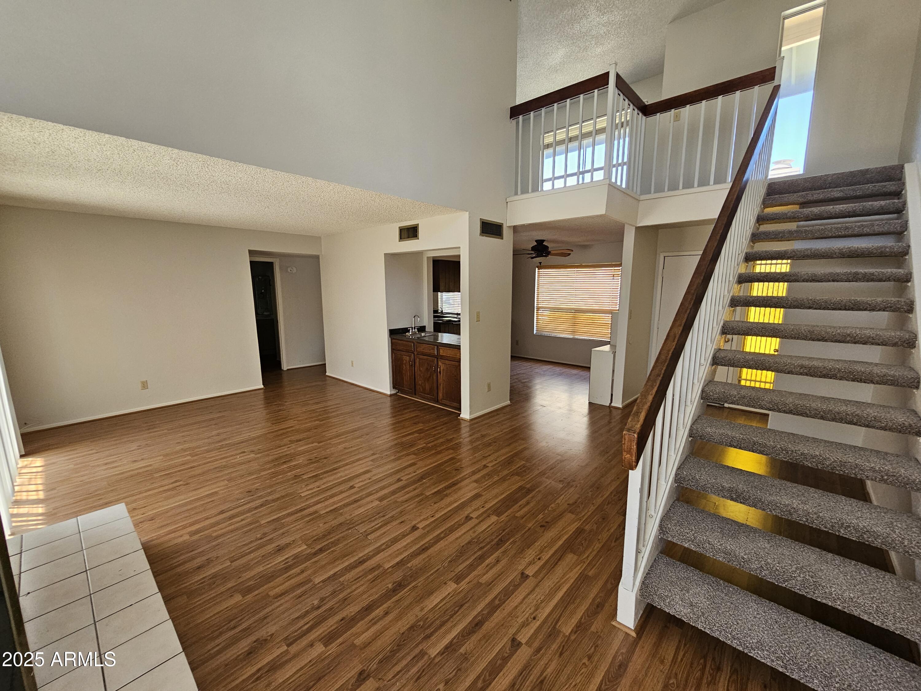18227 North 45th Avenue Glendale, AZ 85308 - Photo 2 of 11 a view of an entryway with wooden floor