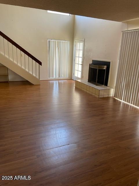 18227 North 45th Avenue Glendale, AZ 85308 - Photo 3 of 11 a view of an empty room with wooden floor and a window