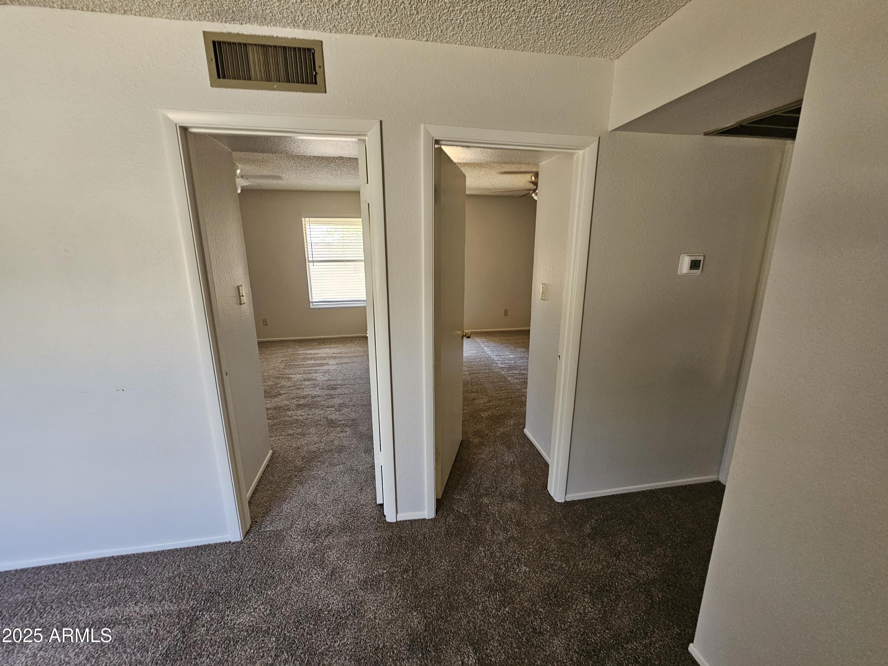 18227 North 45th Avenue Glendale, AZ 85308 - Photo 9 of 11 a view of a livingroom from a hallway