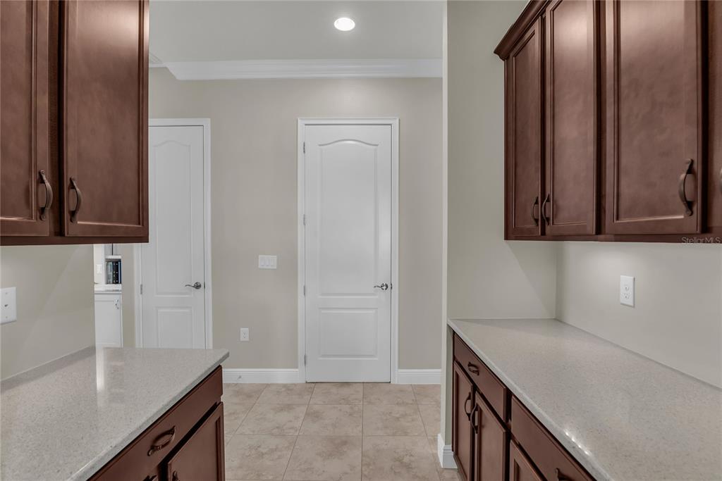 2665 Meadowedge Loop St. Cloud, FL 34772 - Photo 33 of 53 a kitchen with a sink