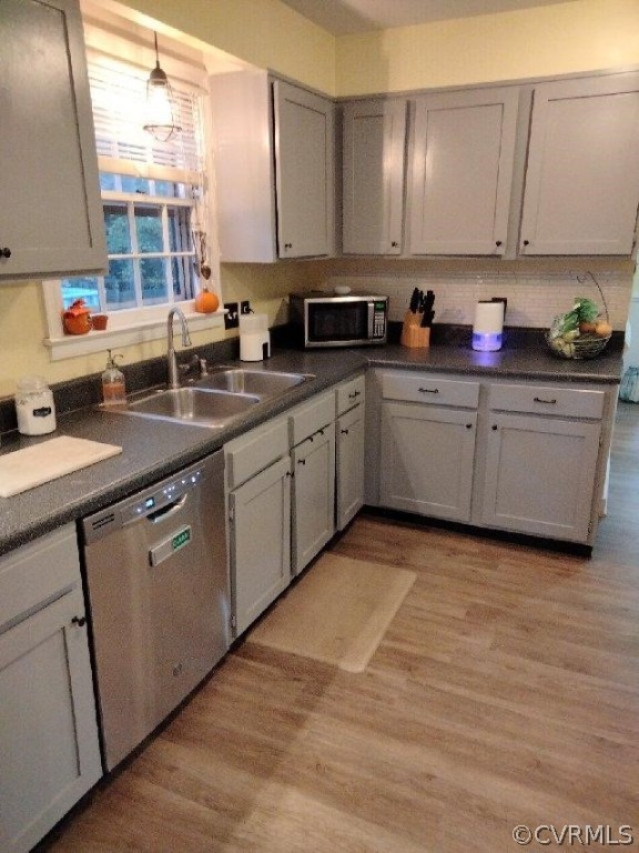 9855 Mosswood Road North Chesterfield, VA 23236 - Photo 6 of 15 a kitchen with a sink window and cabinets
