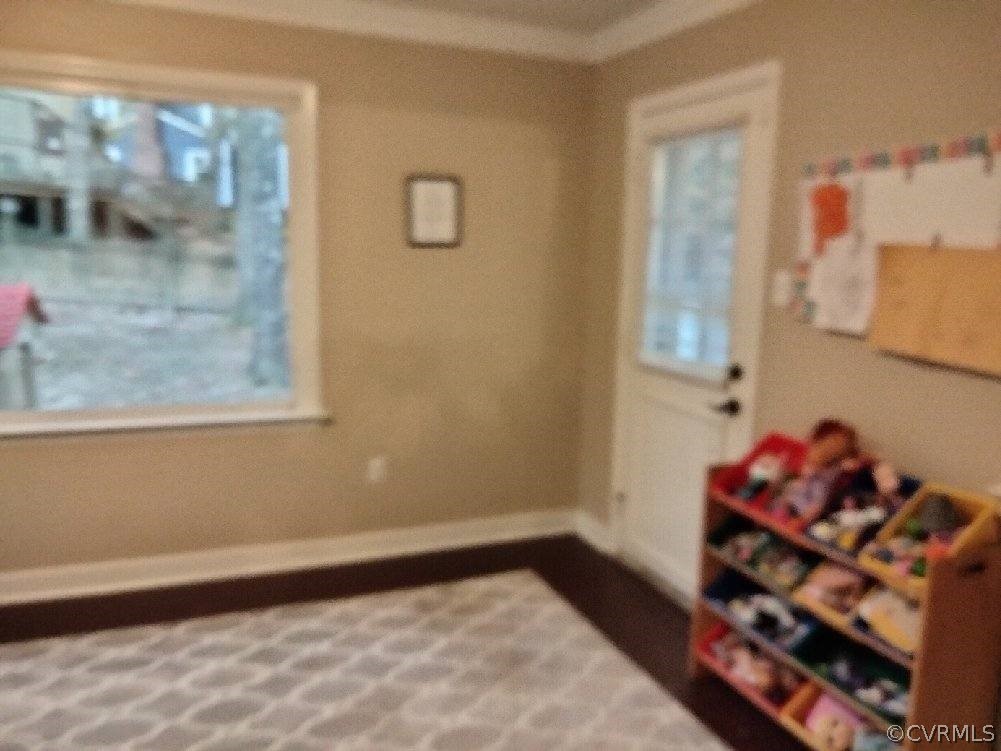 9855 Mosswood Road North Chesterfield, VA 23236 - Photo 8 of 15 a bedroom with a bed and a window