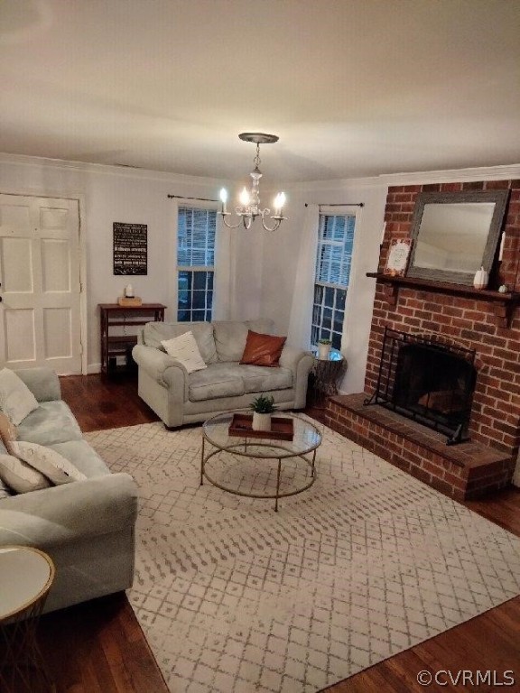 9855 Mosswood Road North Chesterfield, VA 23236 - Photo 9 of 15 a living room with furniture a flat screen tv and a fireplace
