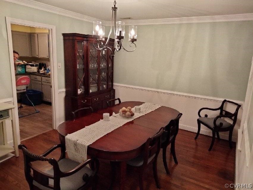 9855 Mosswood Road North Chesterfield, VA 23236 - Photo 10 of 15 a view of a dining room with furniture and wooden floor