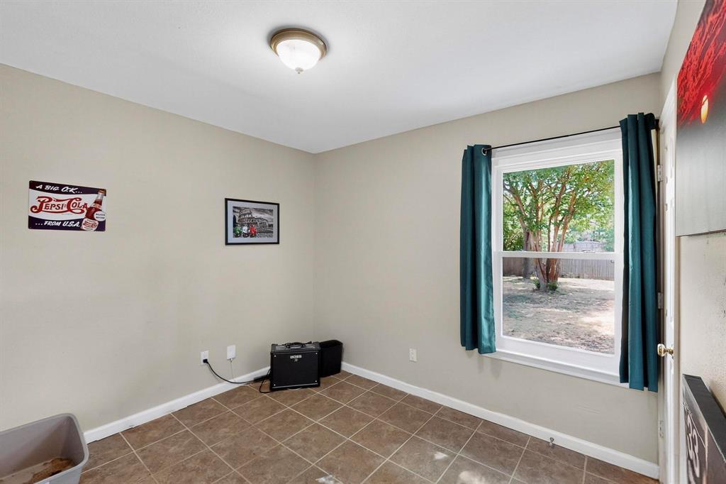 6617 Whitley Road Watauga, TX 76148 - Photo 27 of 36 a view of an empty room with a window