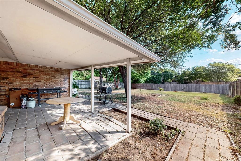 6617 Whitley Road Watauga, TX 76148 - Photo 30 of 36 a view of back yard of the house