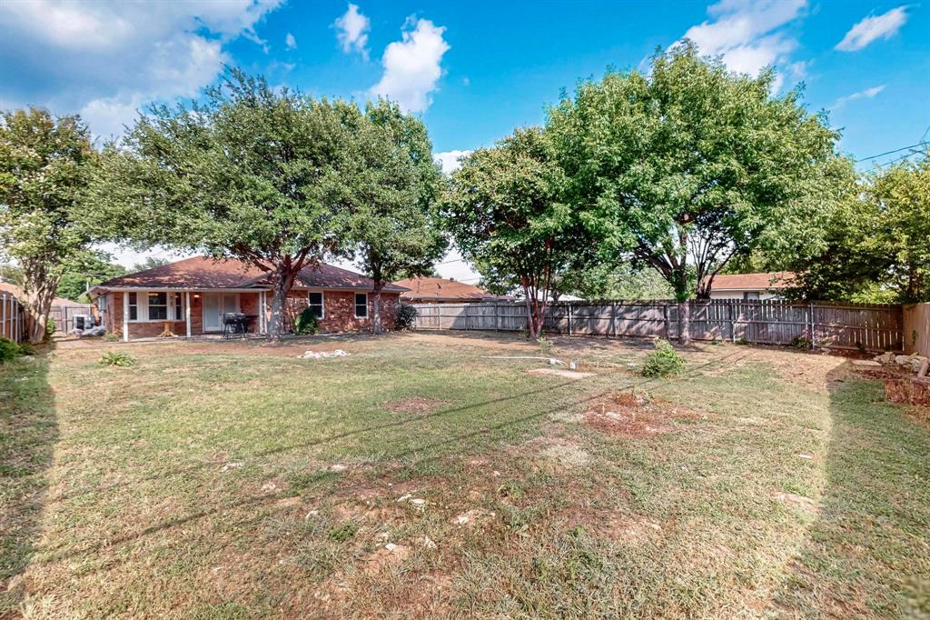6617 Whitley Road Watauga, TX 76148 - Photo 32 of 36 a view of a house with backyard and sitting area