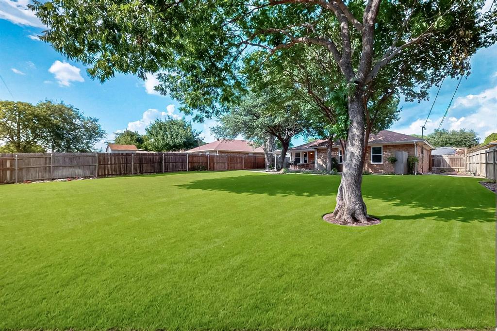6617 Whitley Road Watauga, TX 76148 - Photo 34 of 36 a view of house with a backyard