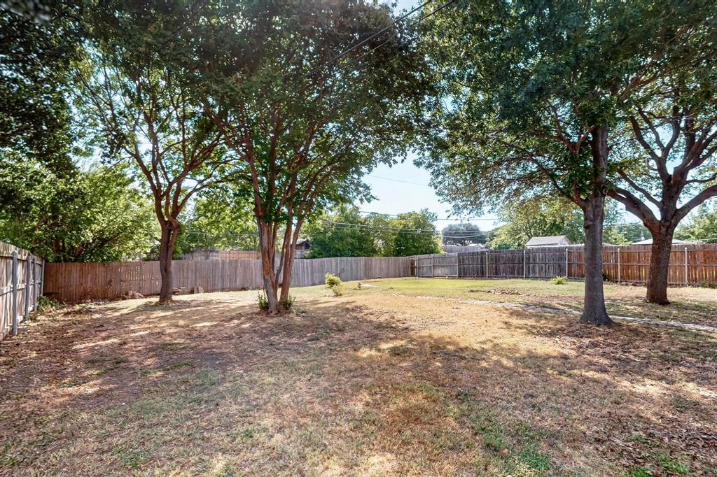 6617 Whitley Road Watauga, TX 76148 - Photo 35 of 36 a view of a yard with a tree