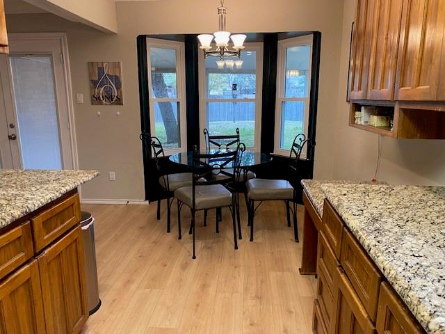 6617 Whitley Road Watauga, TX 76148 - Photo 6 of 36 a view of a kitchen area kitchen island furniture and windows