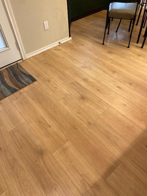 6617 Whitley Road Watauga, TX 76148 - Photo 8 of 36 a view of an empty room with wooden floor