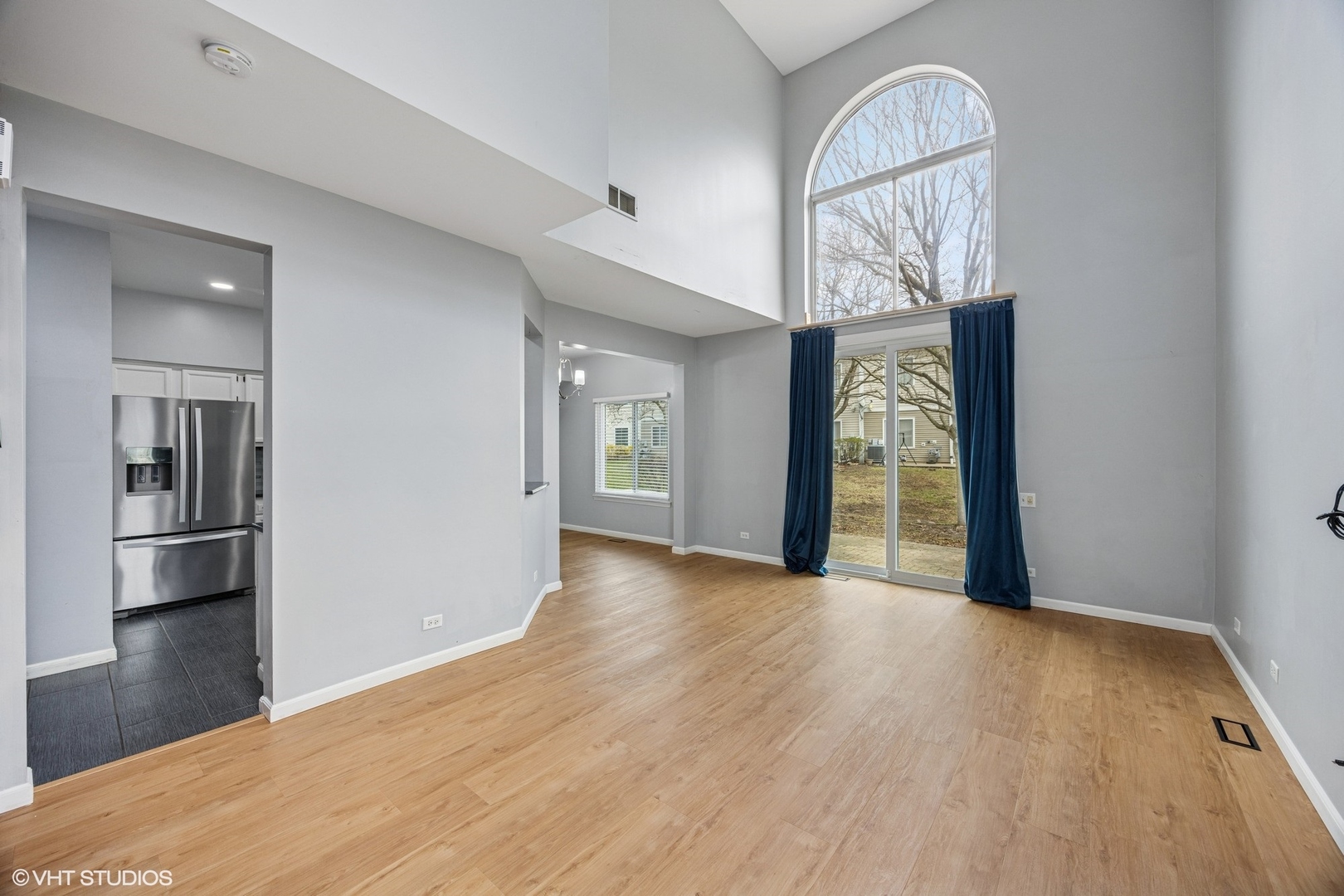 1601 Spaulding Road Bartlett, IL 60103 - Photo 2 of 15 a view of empty room with wooden floor and fan