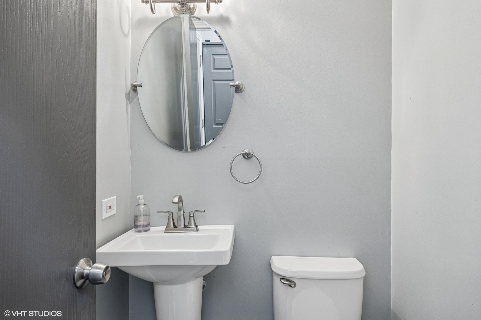 1601 Spaulding Road Bartlett, IL 60103 - Photo 8 of 15 a bathroom with a sink toilet and mirror