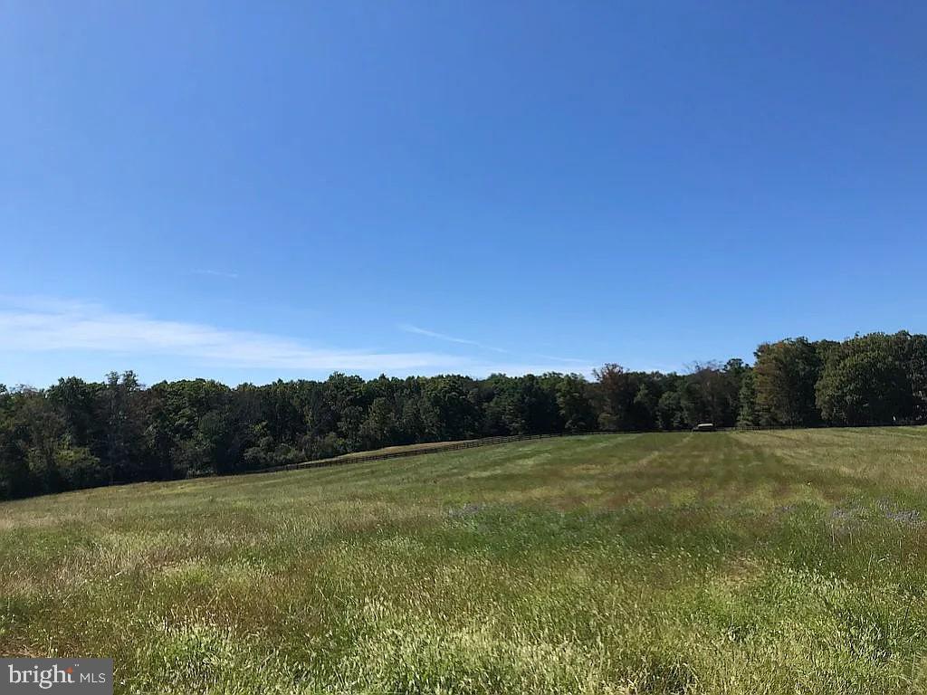 15.4 rolling and cleared acres in prime location