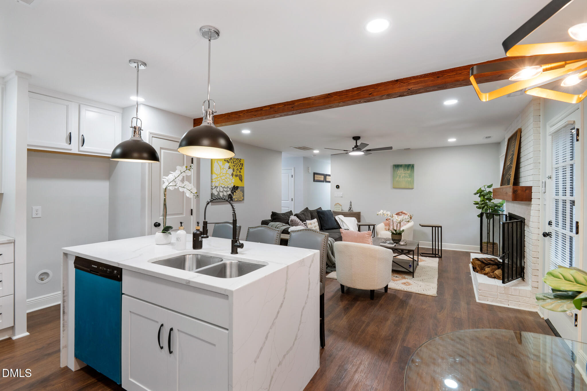 6604 Winding Trail Raleigh, NC 27612 - Photo 21 of 49 a very nice looking living room with a large window and wooden floor