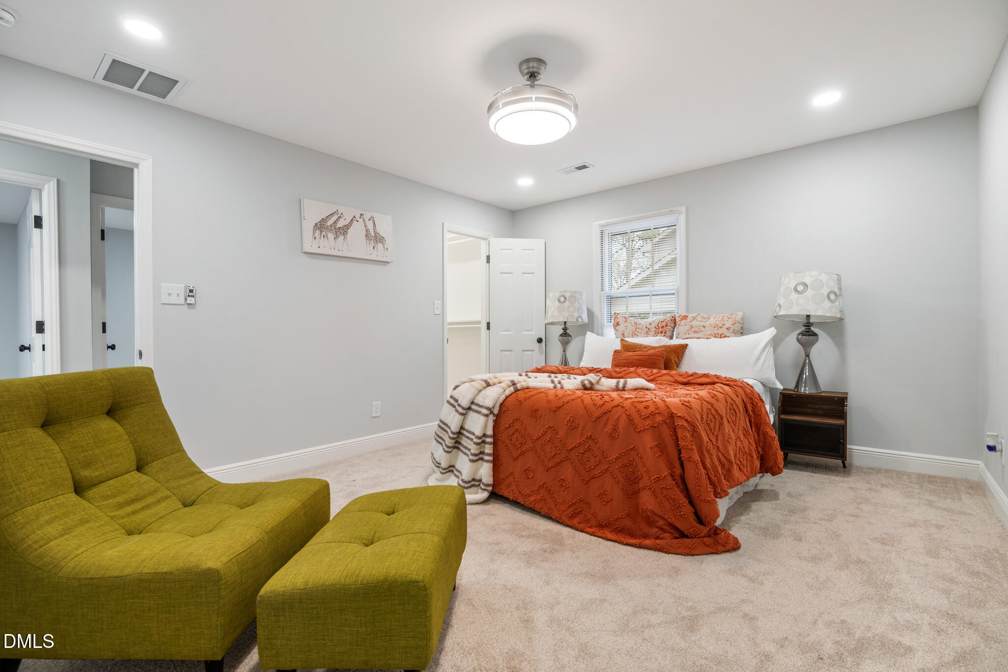 6604 Winding Trail Raleigh, NC 27612 - Photo 26 of 49 a spacious bedroom with a bed and window