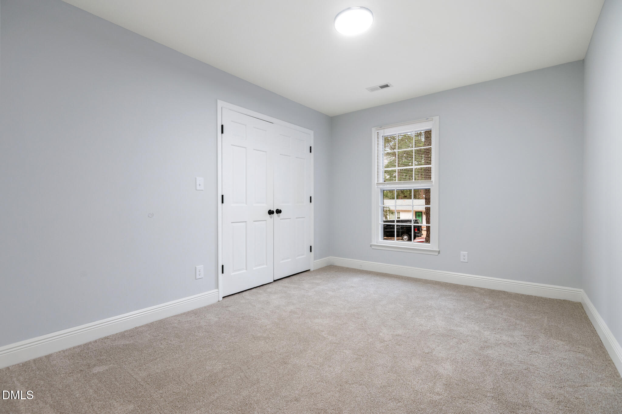 6604 Winding Trail Raleigh, NC 27612 - Photo 37 of 49 a view of an empty room with a window