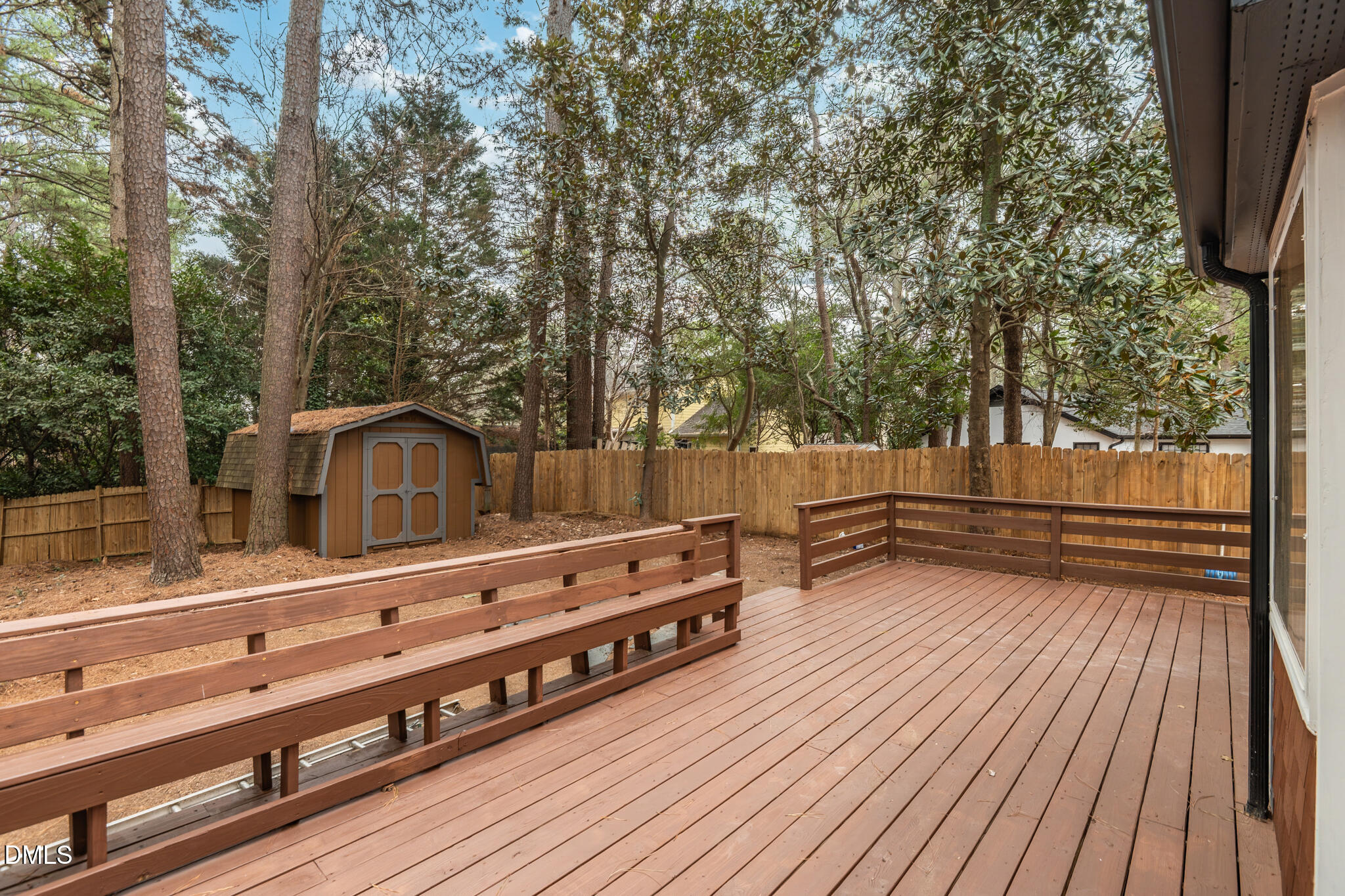 6604 Winding Trail Raleigh, NC 27612 - Photo 39 of 49 a view of a bench in a forest