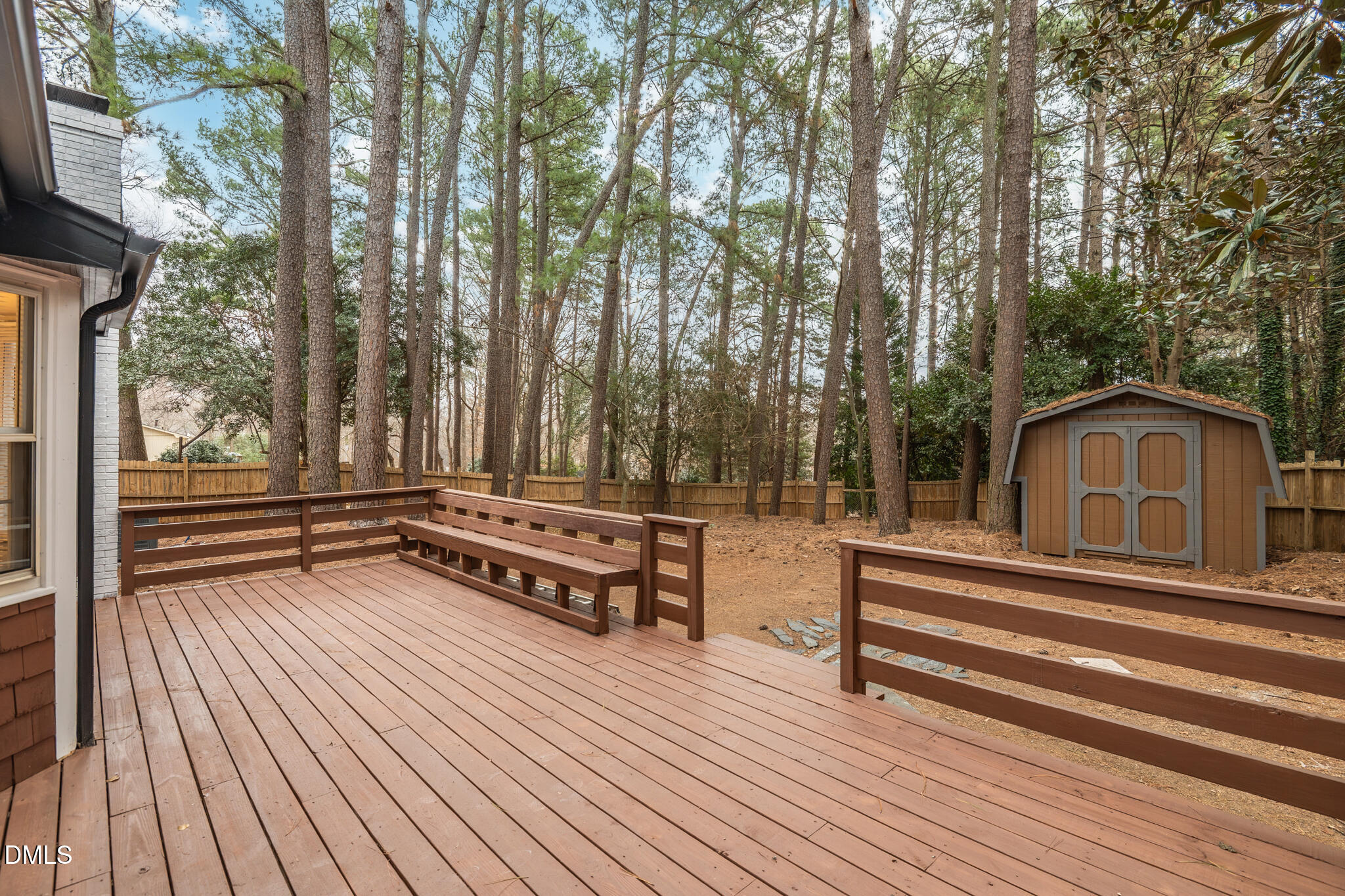 6604 Winding Trail Raleigh, NC 27612 - Photo 40 of 49 a view of a bench in a balcony