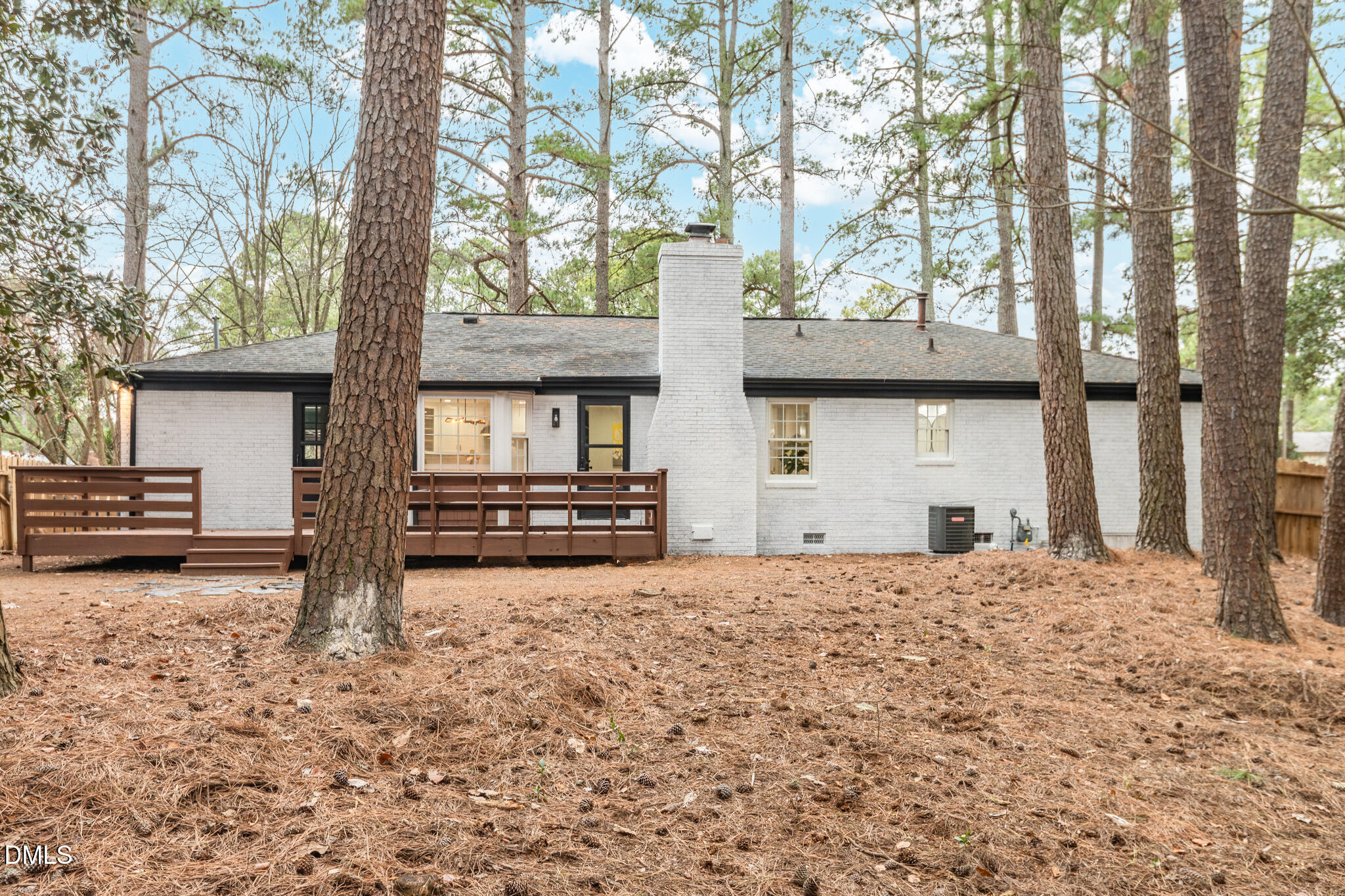 6604 Winding Trail Raleigh, NC 27612 - Photo 43 of 49 a view of a house with a snow in the yard